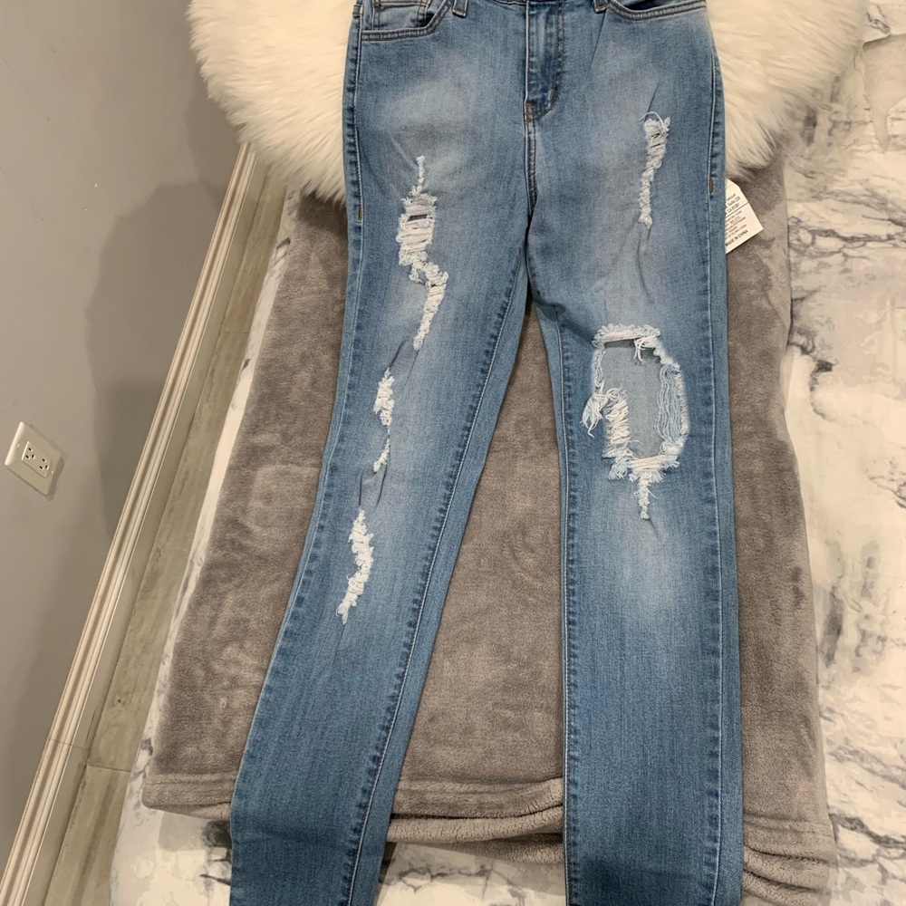 Ripped High Rise Skinny Jeans